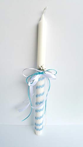 Vela bautizo niño de cera blanca, vela primera comunion,decorada con lazo color azul y flor .medida altura 35 cm.